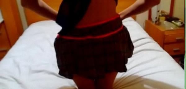 on college girl costume with a pleated miniskirt